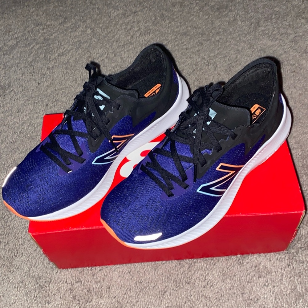 New Balance running shoes. Women size 9.5 with comfortable inserts. NIB